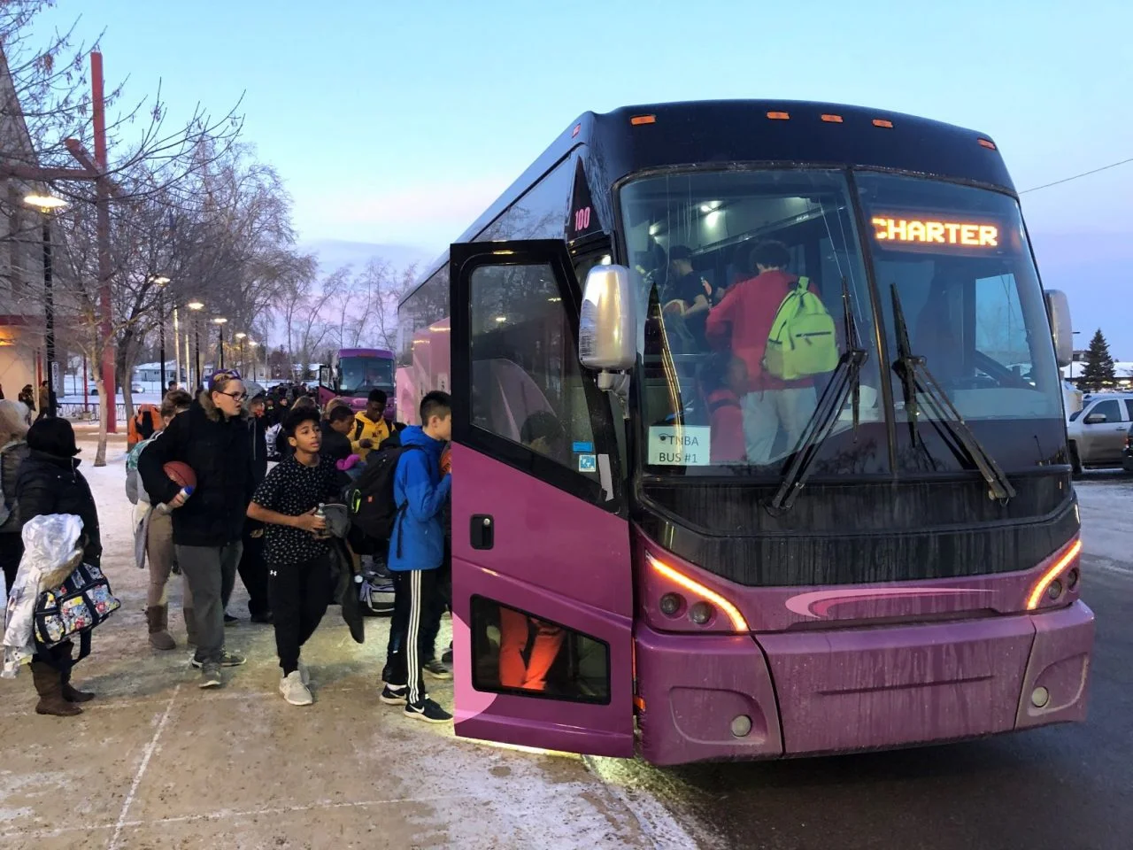 Nagel Coaches with sports teams boarding